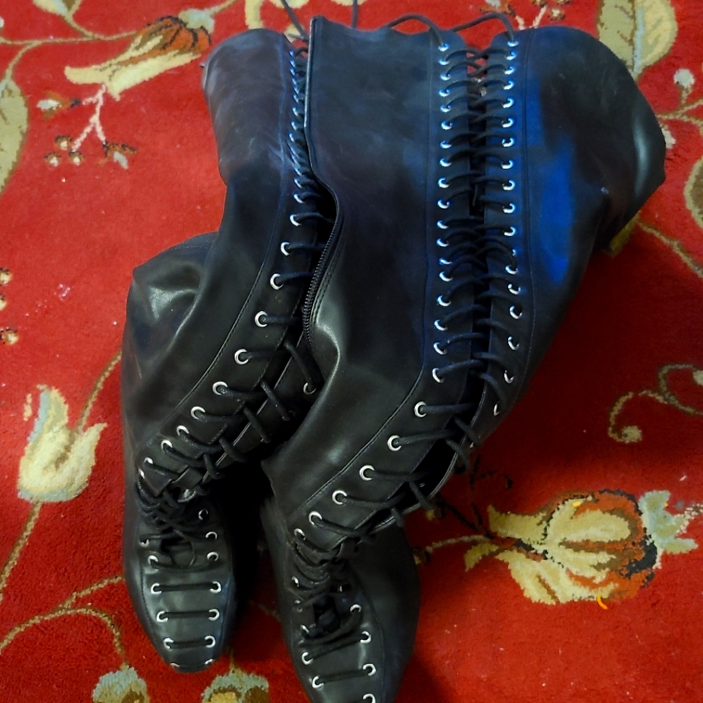 Thigh high wide boots